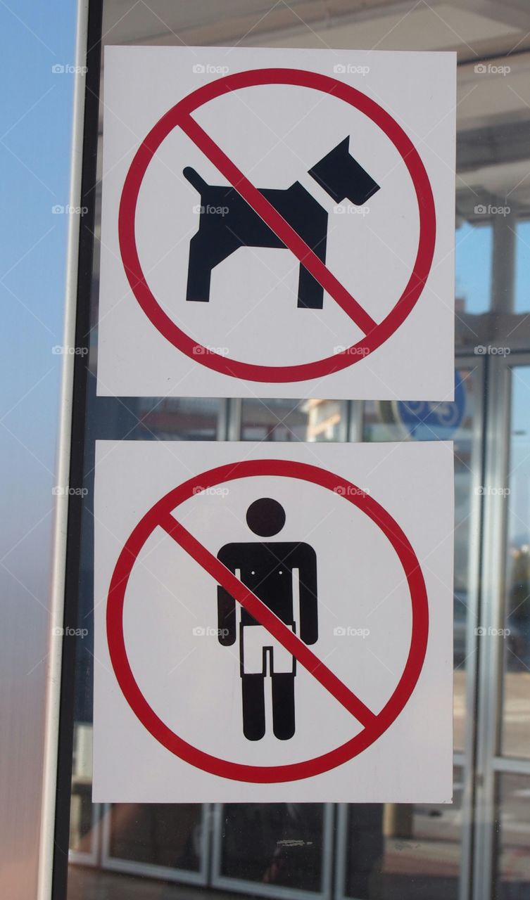 Sign ban of dog and people