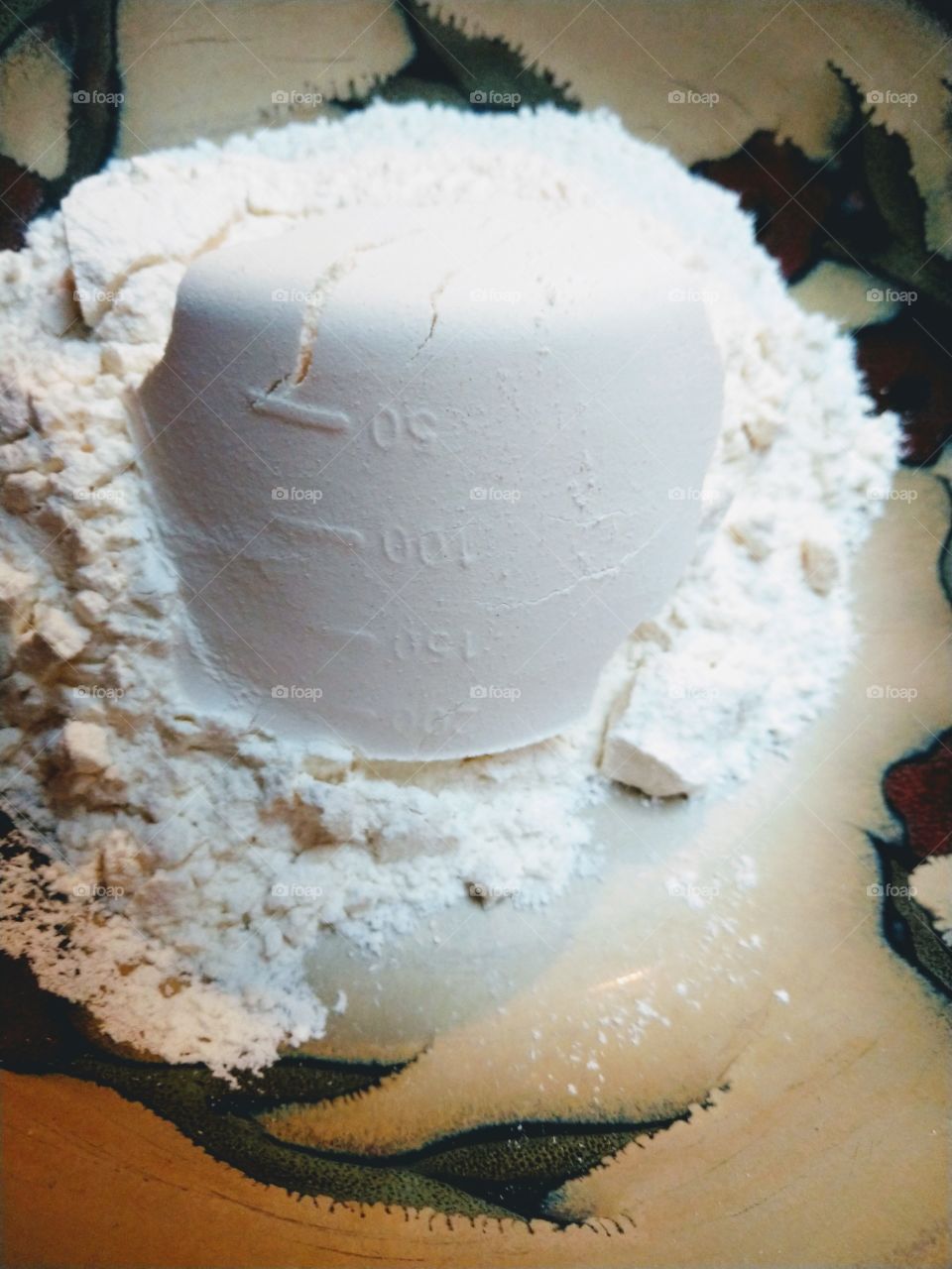 measuring flour baking