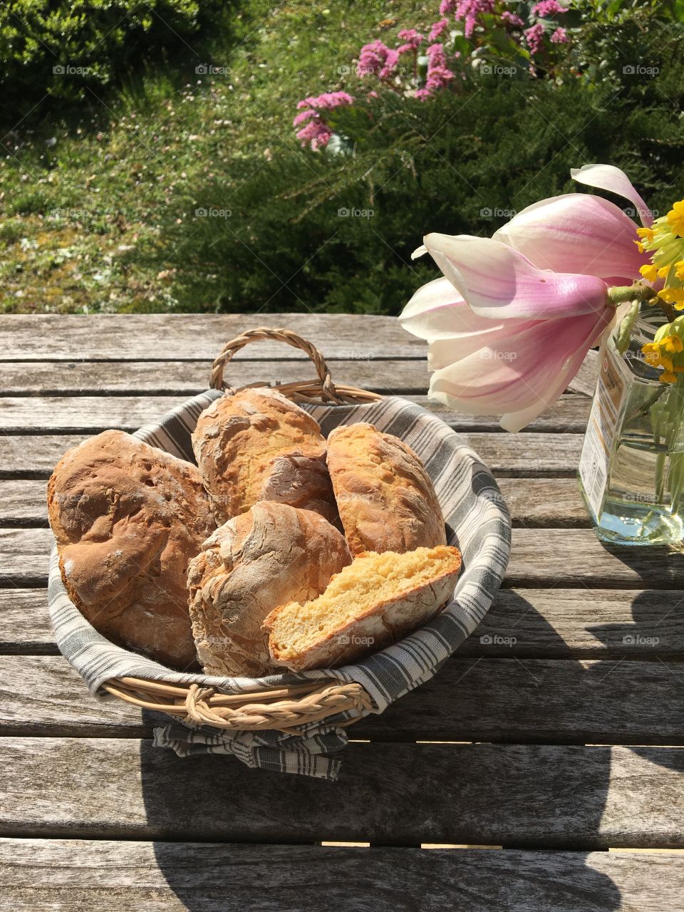 Homemade bread with flowers from the garden