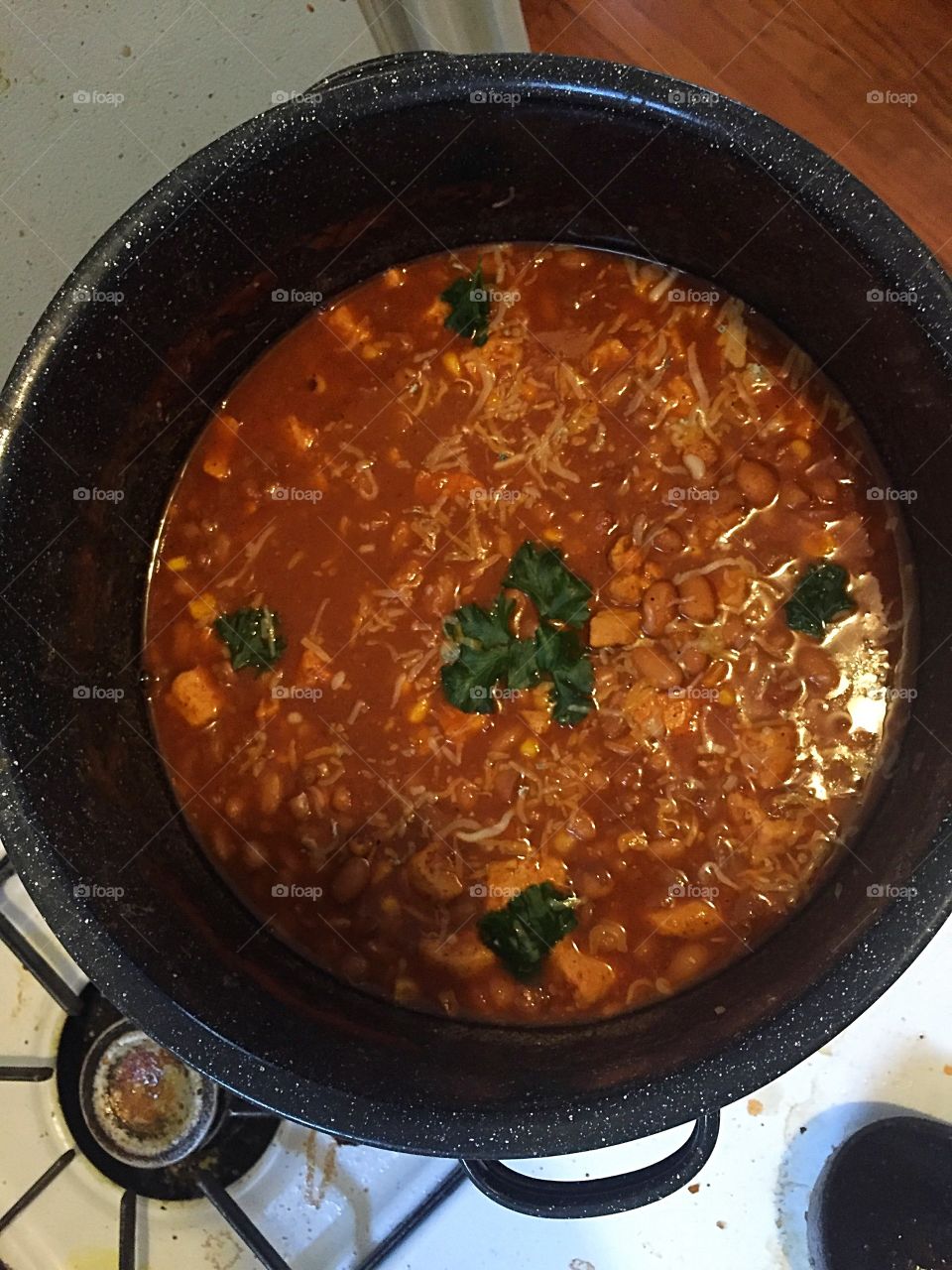 Pot of chicken chili on stove