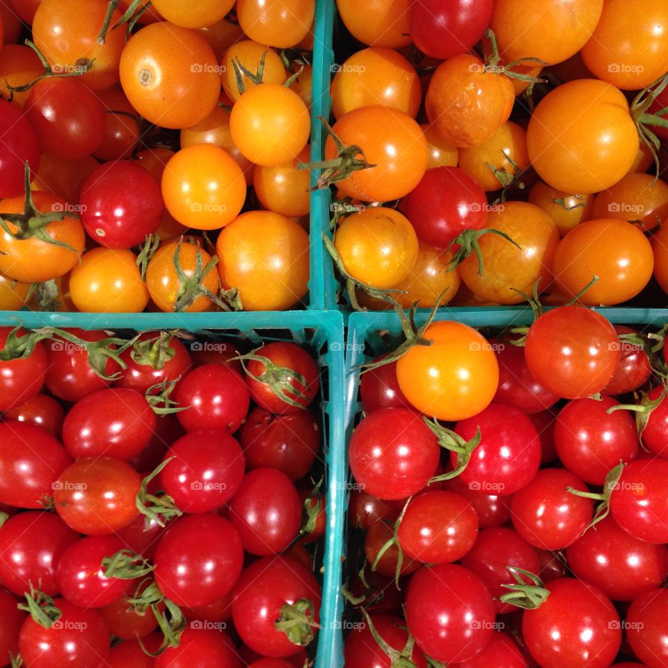 Four baskets of cherry tomatoes 