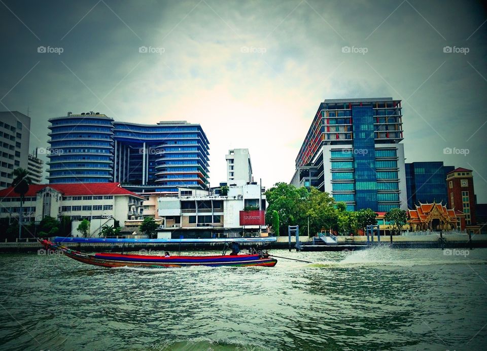 Now I'm on the water. Having boat on the water, Chao praya river