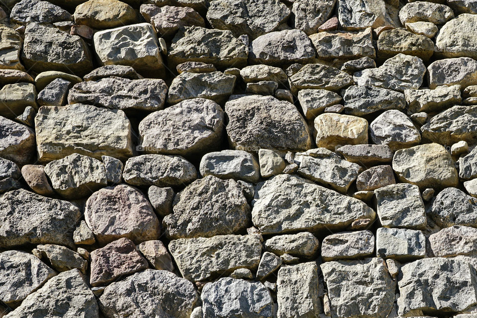 stone wall background of historic ruins