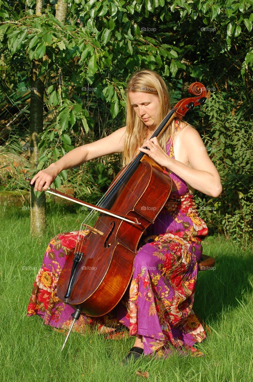Cellist in the garden
