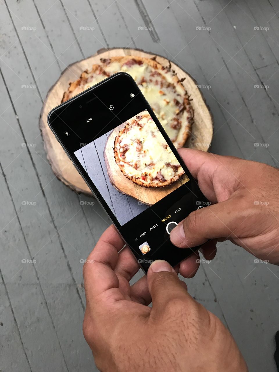 Picture of a picture of cast iron pizza.