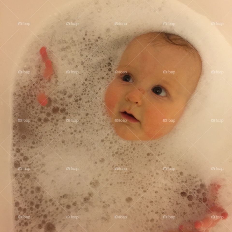 Cute baby in bathtub
