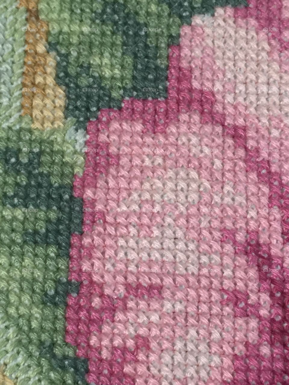 Close up view of cross stitch embroidery
