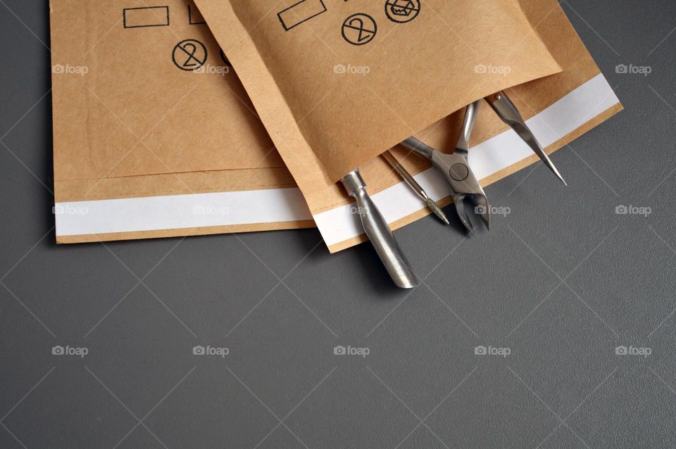 Manicure tools in a kraft bag for sterilization