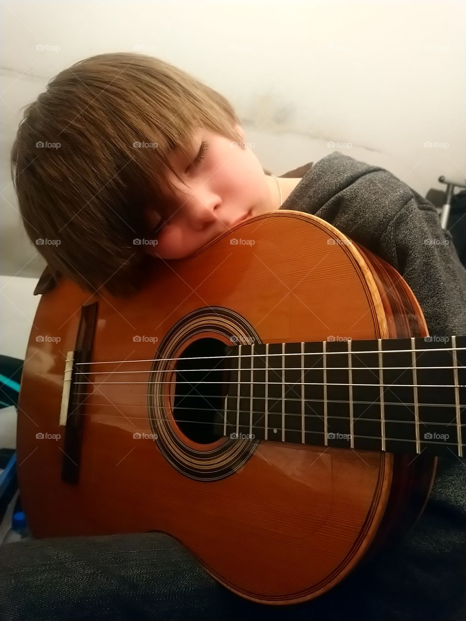 After exhausting playing the guitar