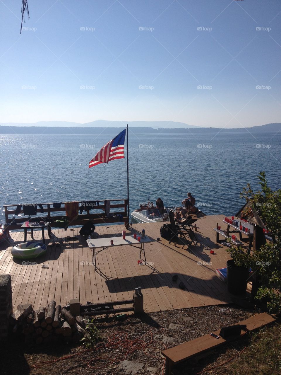 Party on a dock with American flag