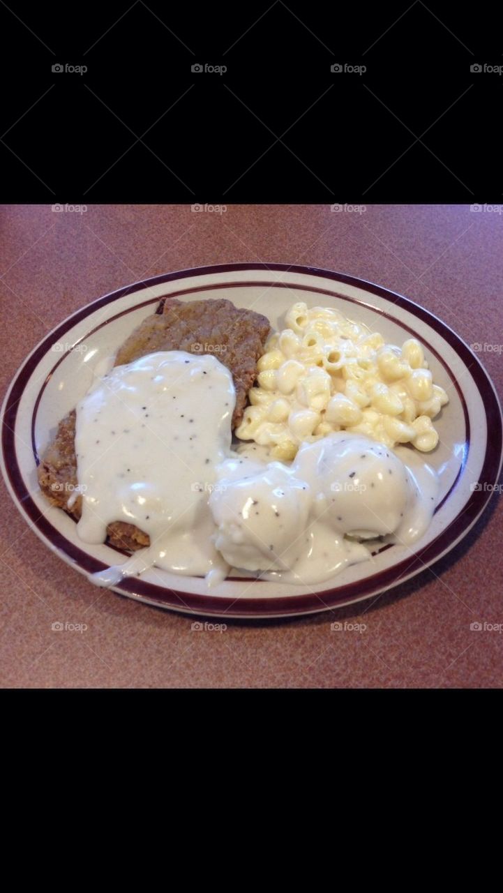 Country fried steak w/ mashed potatoes and mac n cheese