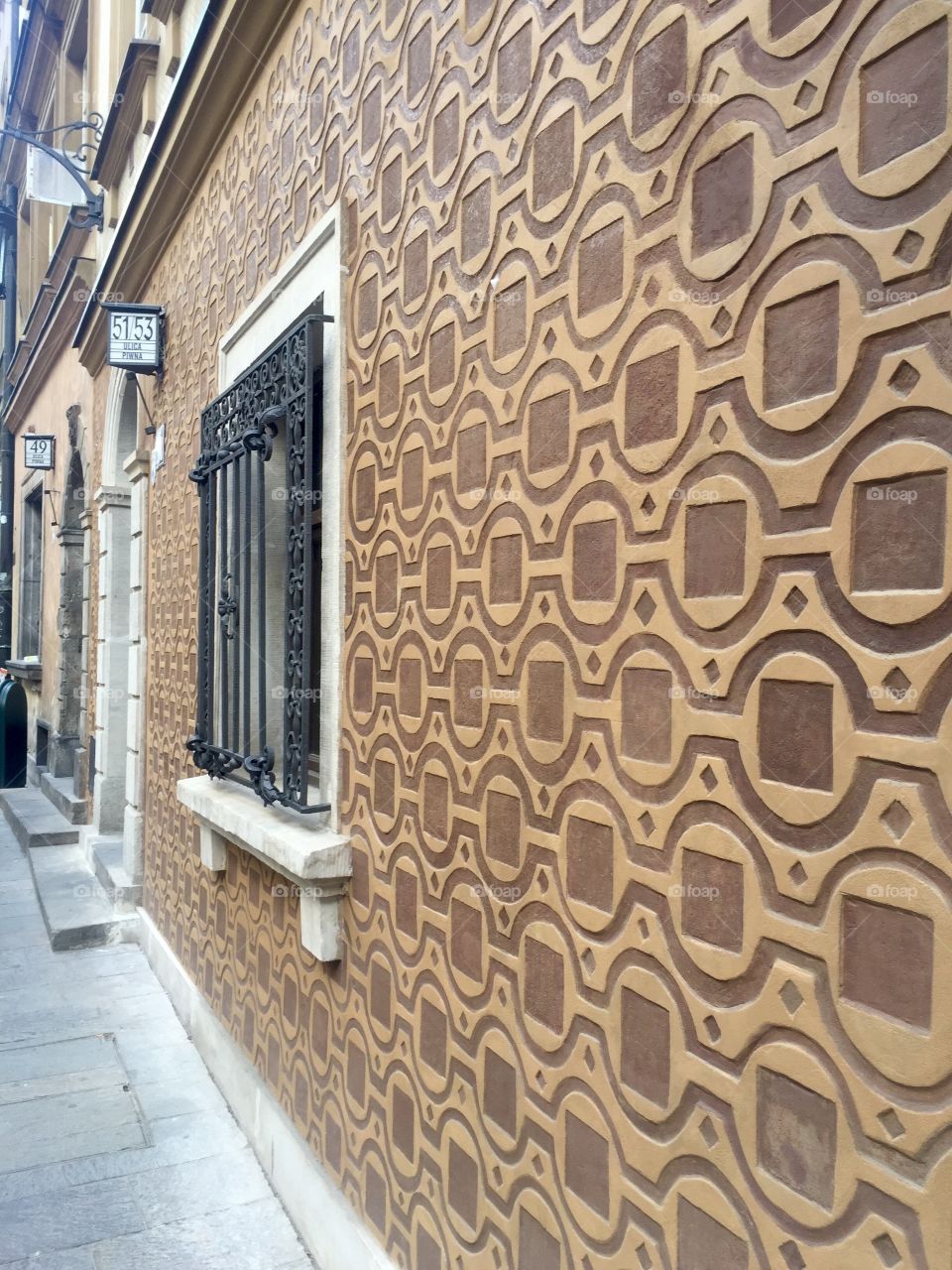 Pattern on house in old town in Warsaw