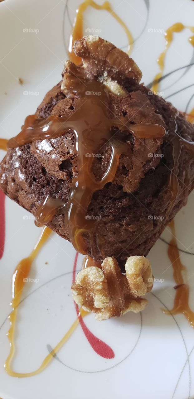 brownies with hot caramel and walnuts