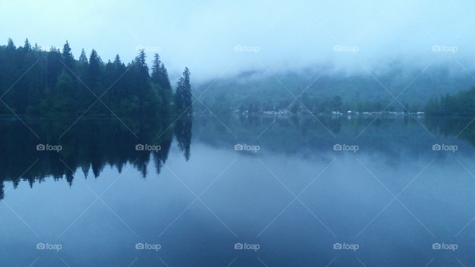 A perfect reflection on Lake McMurray, Washington.