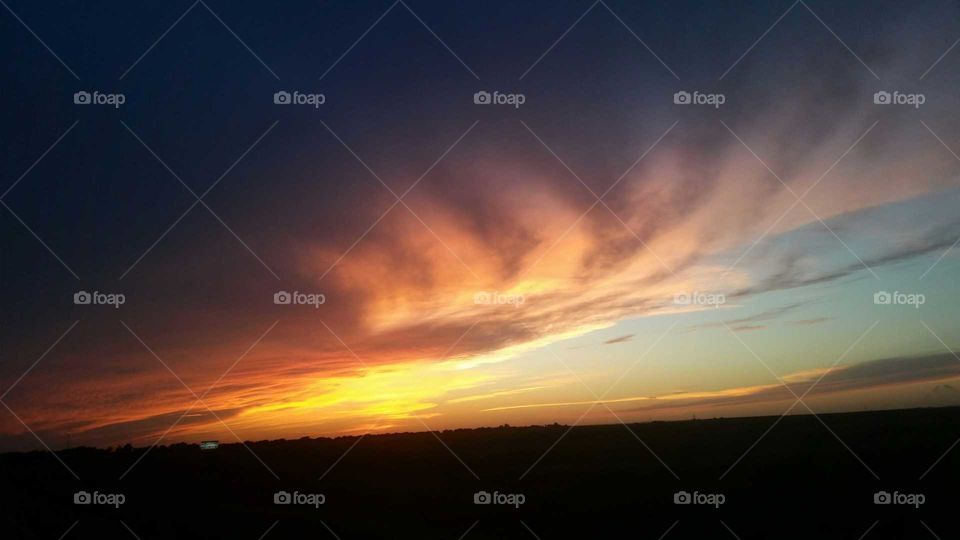 it was a storm clouds at sunset. actually a really intense storm once I got to it.