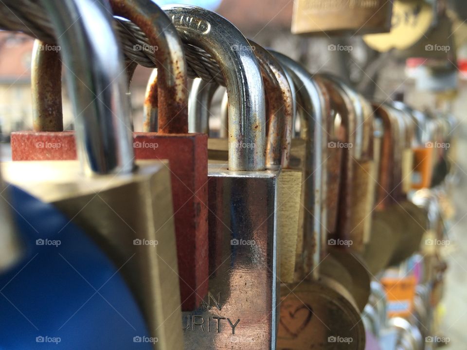 The couples promise of love, by placing a lock on the love bridge during their visit.