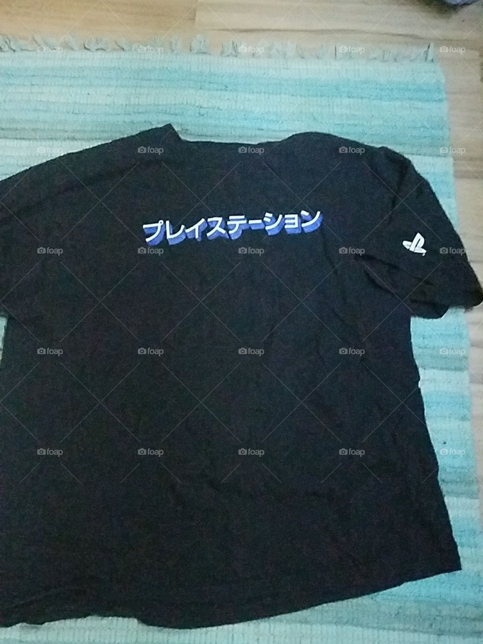 PlayStation shirt (I think it says Electronics)