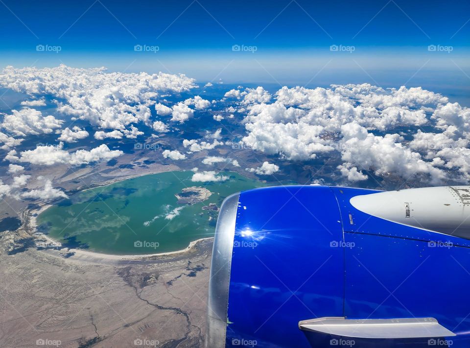 Flying over Mono Lake in California on a clear day with interesting cloud cover