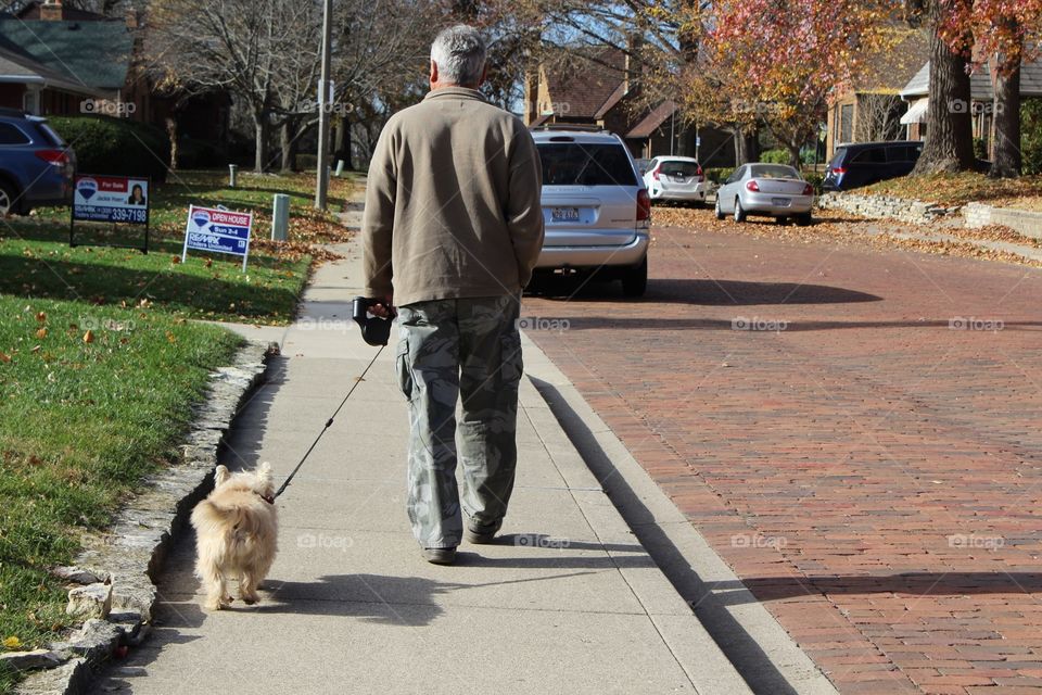 Walking the dog down the road