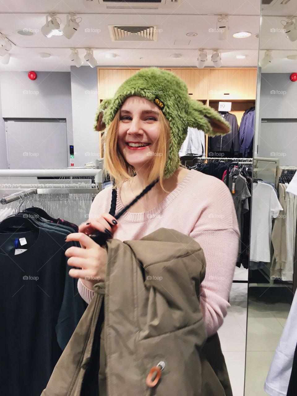 So we were shopping for clothes and she decided to try on some funny fancy hats.