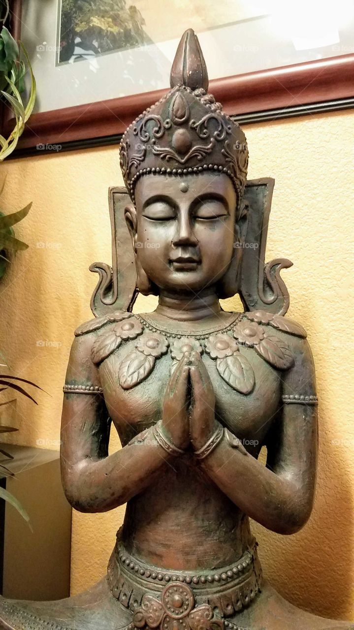 A religious statue inside an office