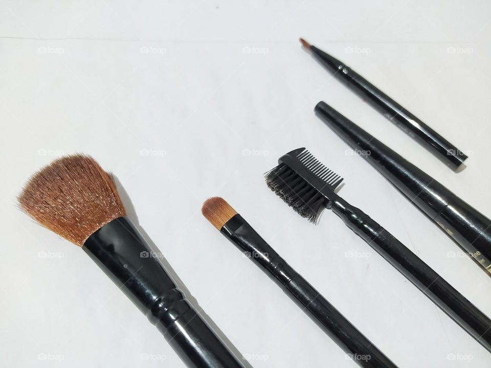 Makeup brushes isolated on white background