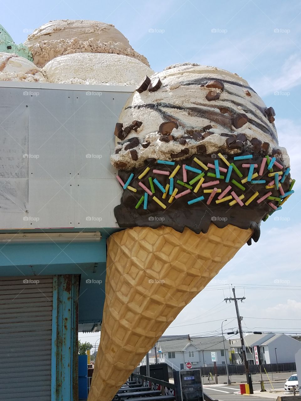 Huge ice cream cone sits atop a store on the boardwalk in seaside heights, nj