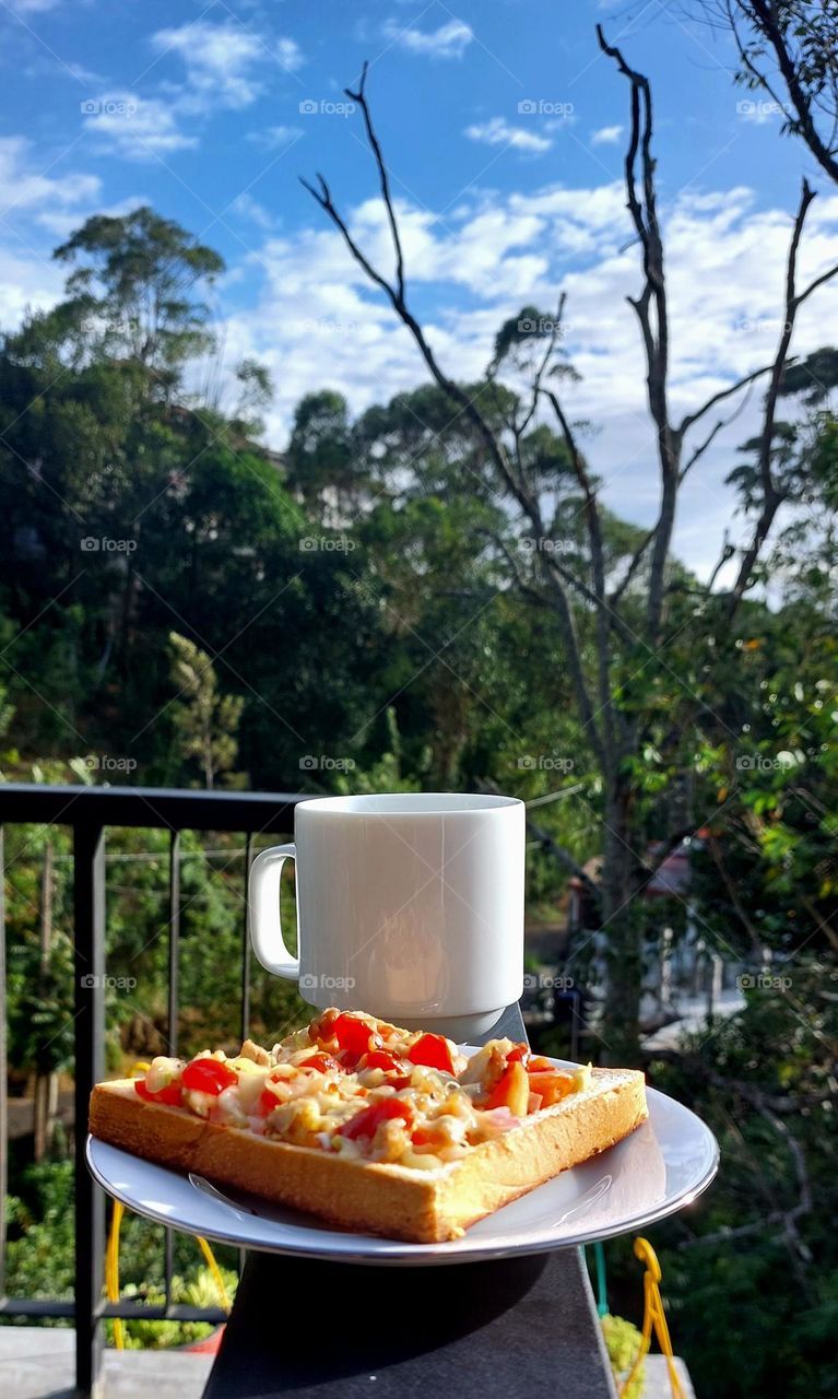 Cup of tea with Bread Pizza