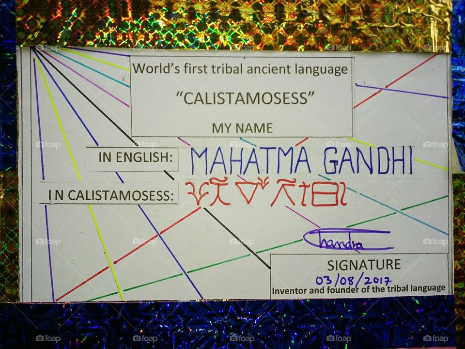 the famous name and "Father of INDIA", MAHATMA  GANDHI is written in the world's first ancient tribal language in the CALISTAMOSESS.