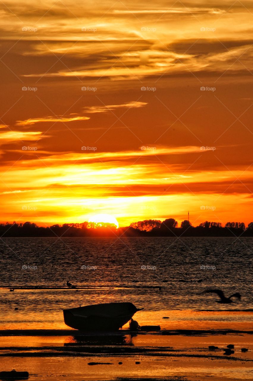 Boat in sunset