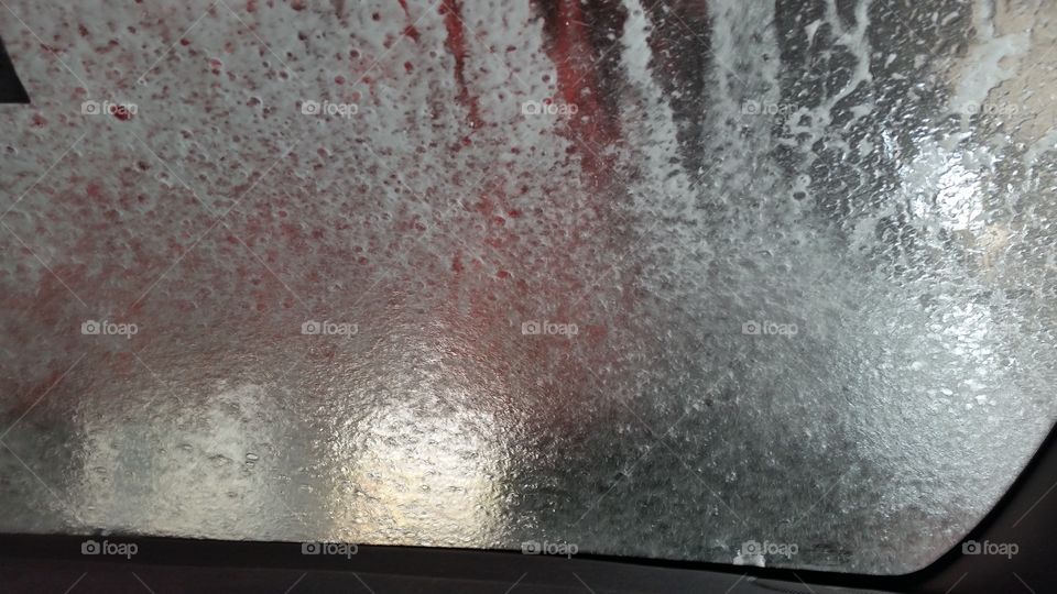 car window, water and soap