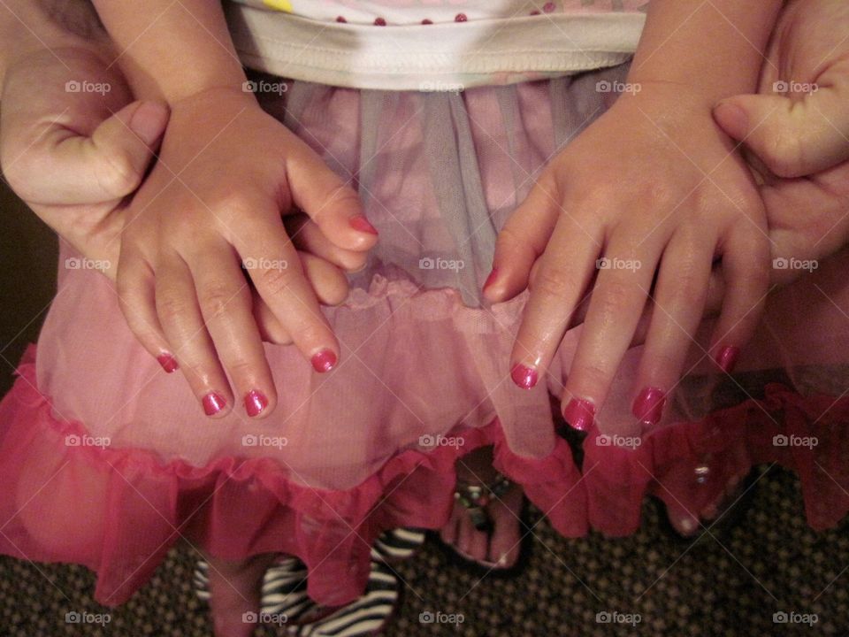 Little girls first manicure. 