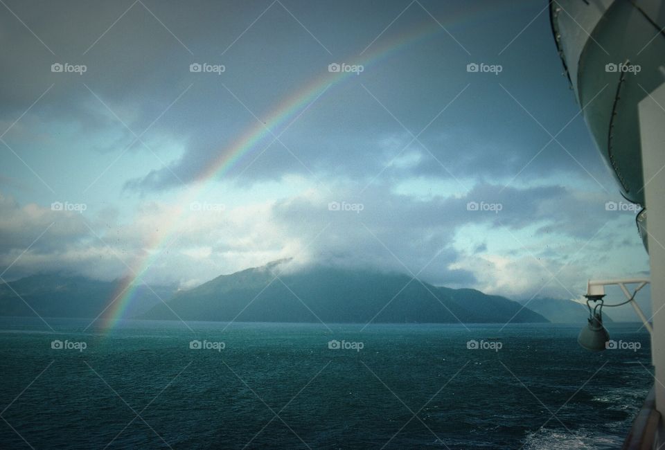 Rainbow over ship bow