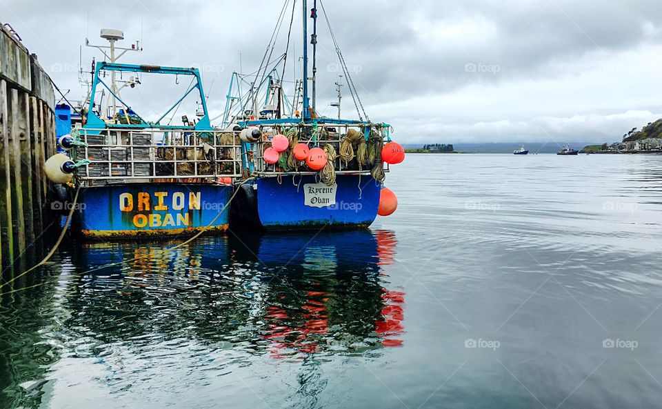 Fishing boats in the harbor of Oban, Scotland