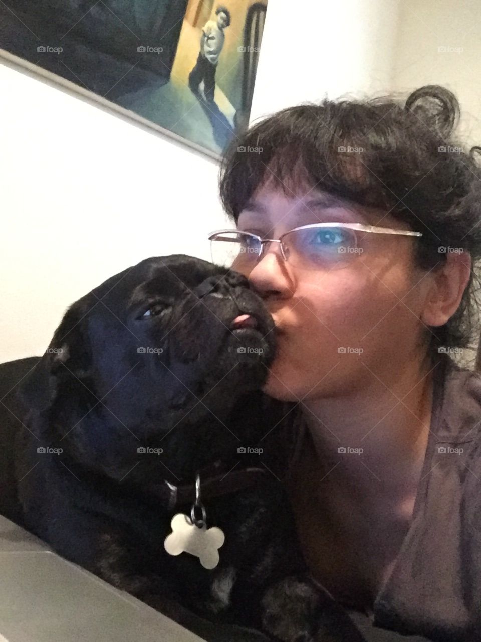 Woman Giving Dog Kiss on Cheek 