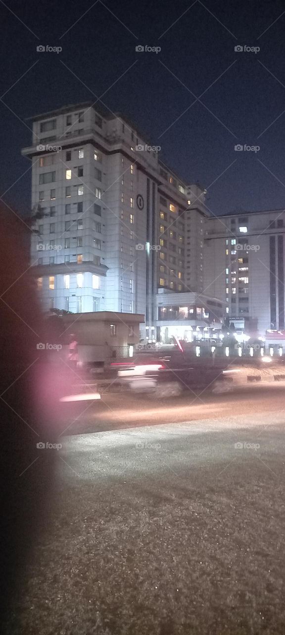 Twinkling windows , the beauty of evening light. Bask in the beauty of evening light with the view of light twinkling from these windows at night