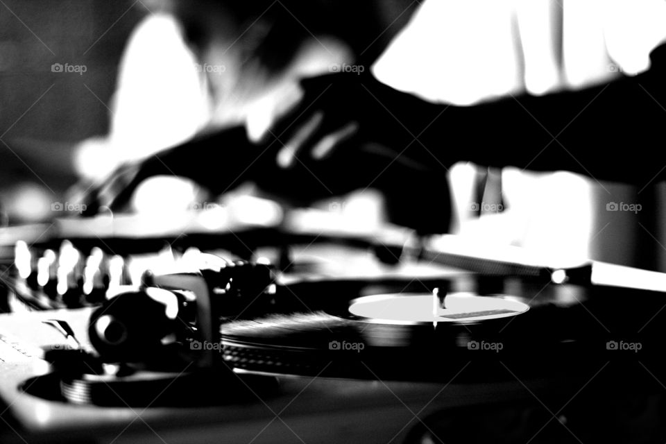 High contrast B/W DJs playing vinyl