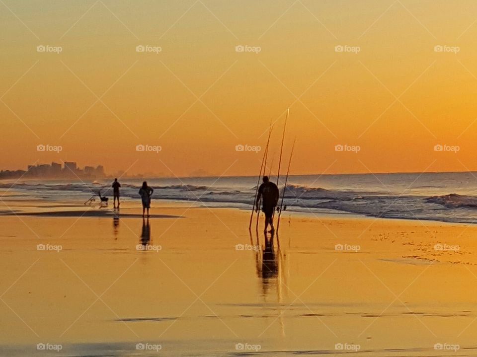 fishing at sunrise