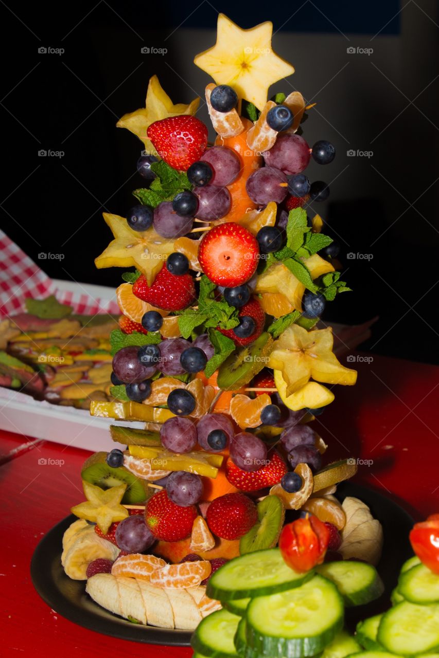 Christmastree made out of fruit for the childrens christmas dinner