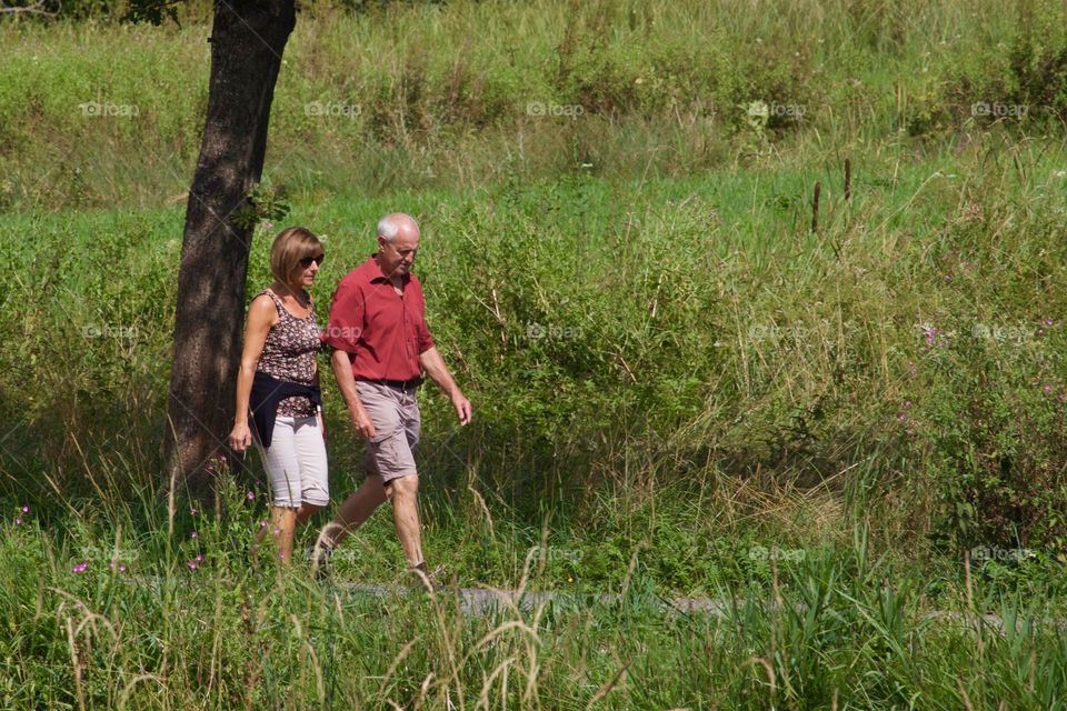 Elderly Couple Taking A Walk