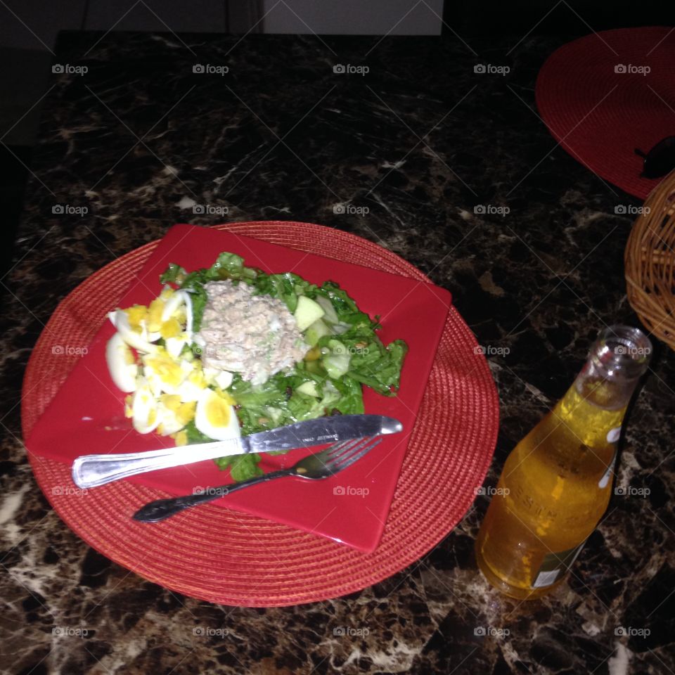Tuna salad with a cold beer on the side 