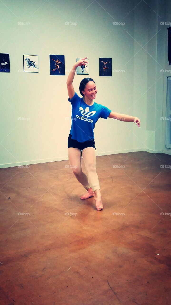 Female dancer practicing in room