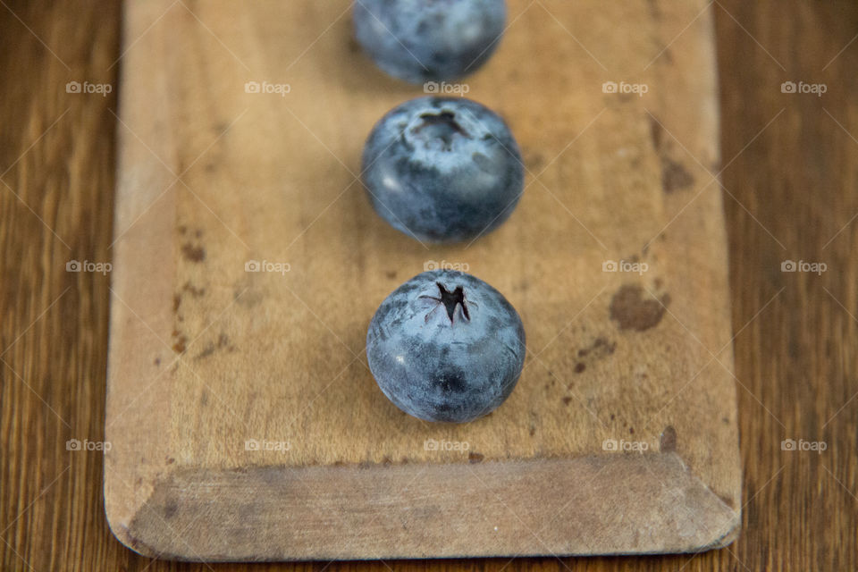 Close-up of blueberries on table