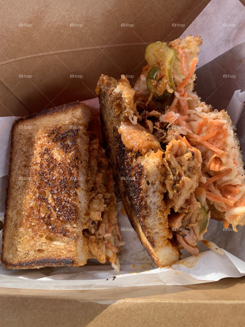 Smoked chicken sandwich from a food truck. 