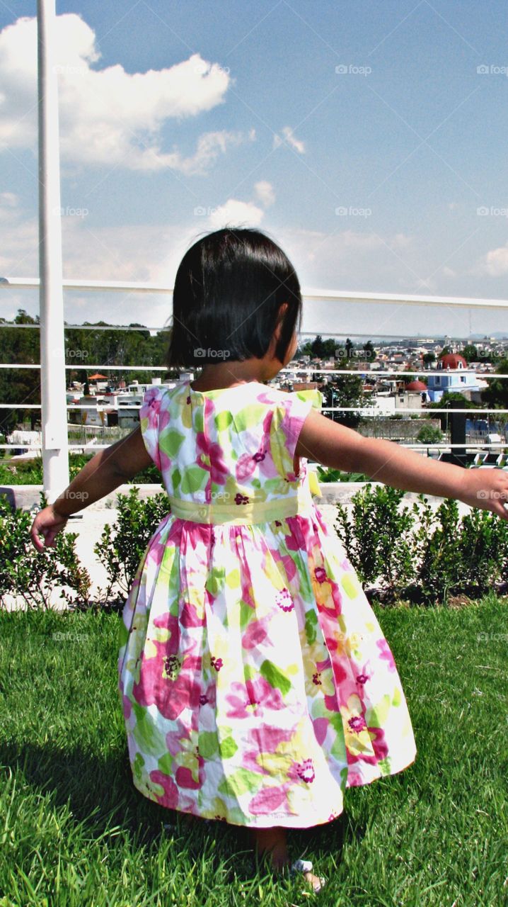 I'm World's Queen!. My little girl turning at Garden.