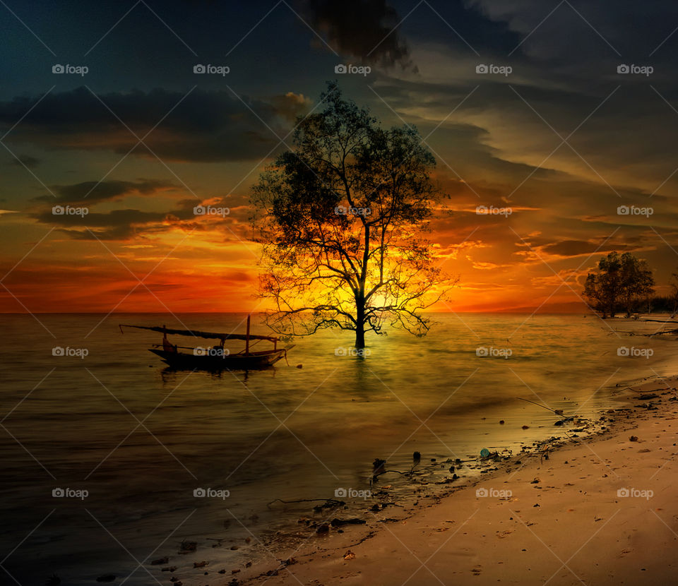 sunset at tanjung beach