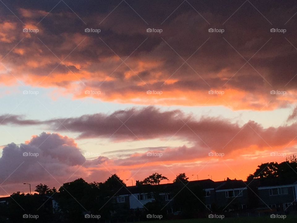 John Smalley . Sunset over skelmersdale  with clouds 
