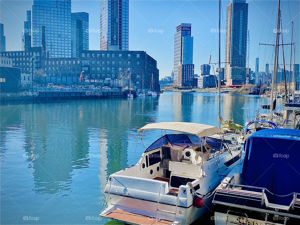 Another view of the “East River” at “Newtown Creek” by the “Pulaski Bridge” in “Long Island City”,, Queens, NY on a bright sunny summer afternoon in 2022. Hypnotic Productions