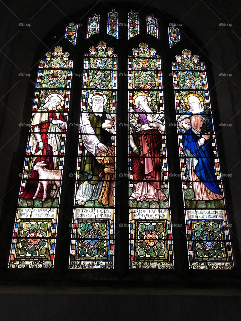 One of the very beautiful stain glass windows, to be found at St Michaels Church, Ilsington on Dartmoor, Devon.