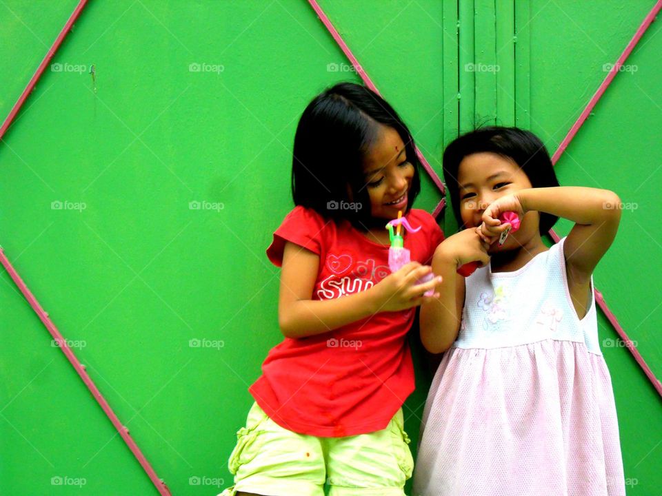 young asian girls laughing